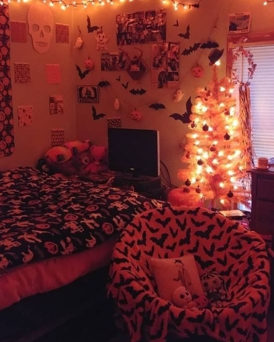 a bedroom decorated for halloween with lights on the ceiling and decorations all over the room