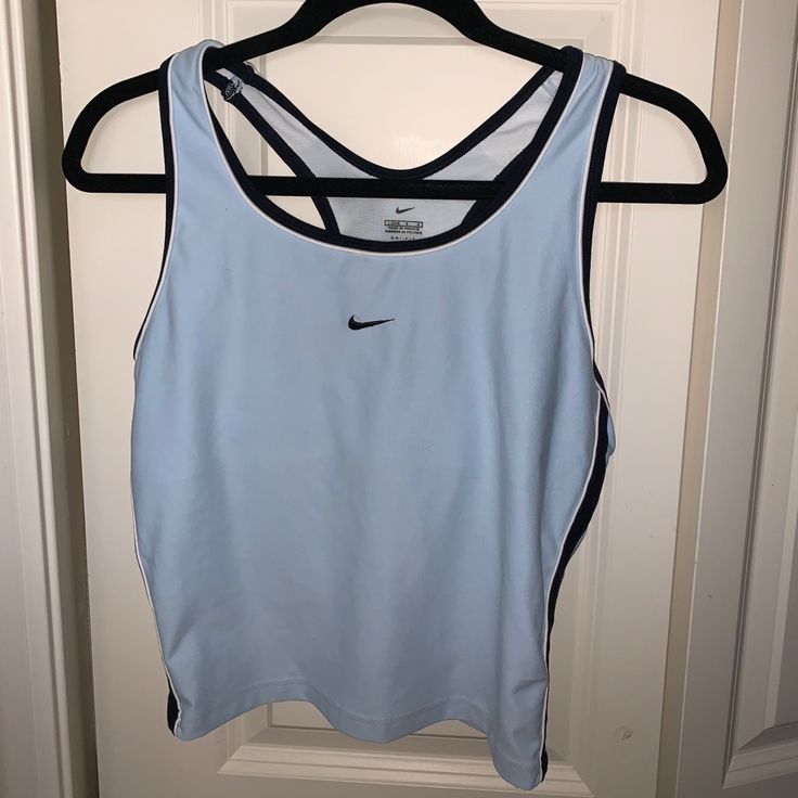 Light Blue, Semi Cropped Tanktop. Built In Sports Bra. Almost Brand New Condition Blue Sportswear Top For Summer, Blue Summer Sportswear Tops, Light Blue Sporty Tops For Gym, Light Blue Sporty Gym Tops, Light Blue Sleeveless Athleisure Top, Moisture-wicking Light Blue Workout Top, Light Blue Athleisure Gym Tops, Light Blue Athleisure Tops For Gym, Light Blue Moisture-wicking Athleisure Top