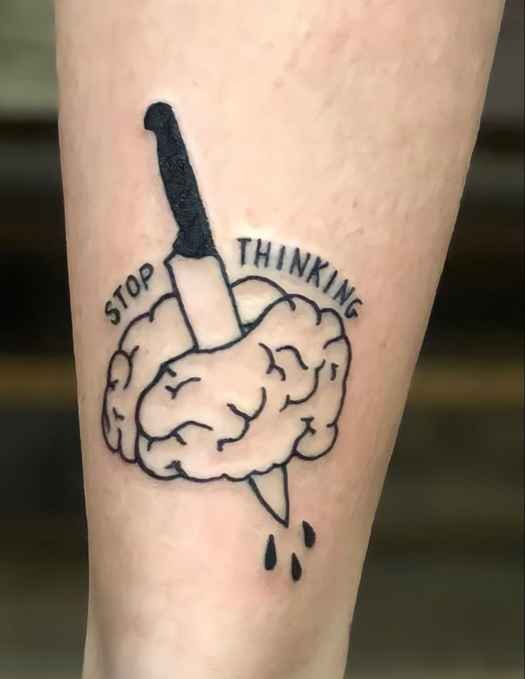 a person with a knife stuck in the side of their leg that says stop thinking