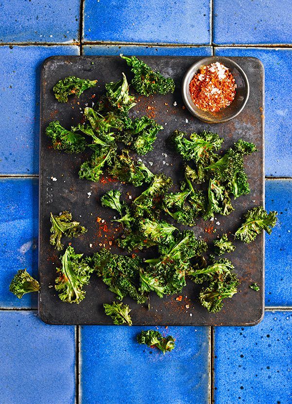 broccoli florets on a tray with seasoning