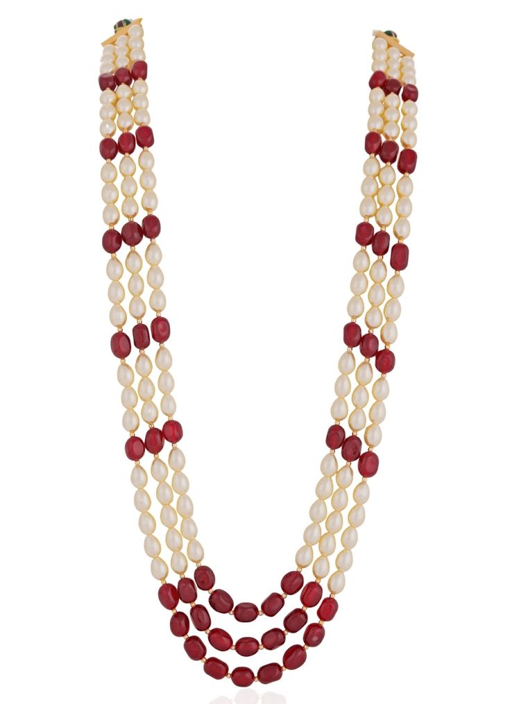 This exquisite Ruby and Pearl Beaded Necklace features a stunning arrangement of vibrant rubies interspersed with lustrous pearls, creating a harmonious blend of color and elegance. The necklace is meticulously crafted to enhance the natural beauty of the gemstones, making it a perfect accessory for both formal occasions and everyday wear. Its unique design not only showcases the rich hues of the rubies but also adds a touch of sophistication with the classic appeal of pearls, ensuring it stands Ruby And Pearl, Pearl Beaded Necklace, Indian Wedding Wear, Wedding Wear, Pearl Beads, Indian Jewelry, Indian Wedding, Semi Precious, Natural Beauty