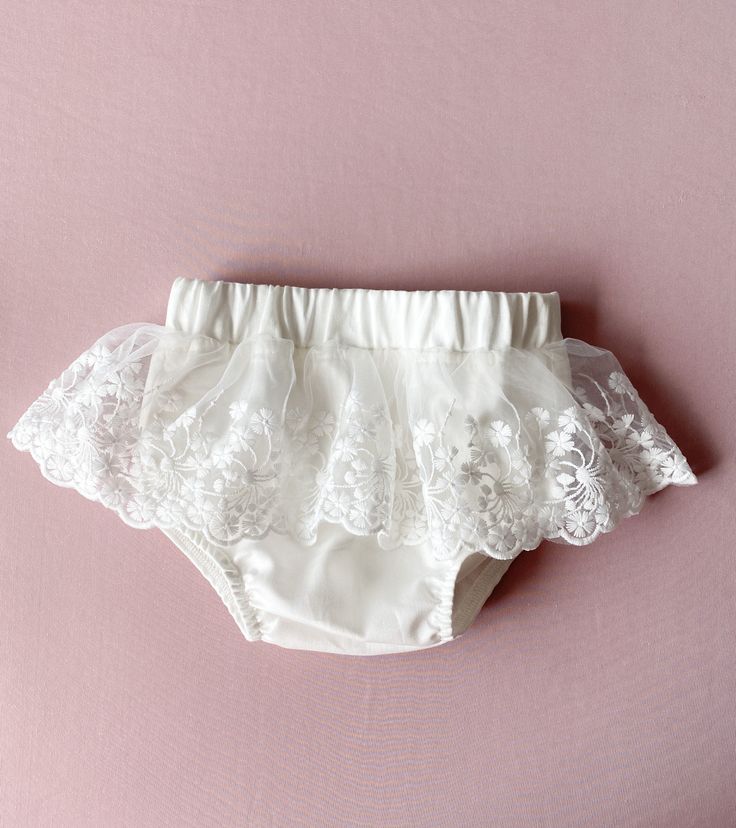 Ivory baby girl bloomers. The fabric is  natural cotton. You can order all matching baptism out: dress, headband, shoes. Please, use the links: *dress: https://www.etsy.com/listing/1462594915/baptism-dress-for-baby-girl-christening?click_key=016383318fba970c06c0fcf867711d818790fd98%3A1462594915&click_sum=f7ffb1fd&ref=shop_home_active_1&frs=1&sts=1 *headband: https://www.etsy.com/listing/1462604251/christening-headband-lace-bow-ivory?click_key=71867b64df5cee90583fc6a9a97439f613ed7c46%3A1462604251&click_sum=71da5b62&ref=shop_home_active_1&frs=1&sts=1 *shoes: https://www.etsy.com/listing/1462601197/ivory-baptism-shoes-christening-booties?click_key=b6c66491f006a0ea975d24fcb95094905e0285b3%3A1462601197&click_sum=39c96ce3&ref=shop_home_active_1&frs=1&sts=1 Wash & care instructions: Steam out the White Lace Baptism Dress With Ruffles, Cute Lace Baptism Dress, Cute Lace Baptism Dress With Lace Trim, White Lace Ruffled Bottoms, Summer Baptism Dress With Lace Work, White Elegant Baptism Dress For First Birthday, Elegant White Baptism Dress For First Birthday, Cream Ruffled Baptism Dress, Cute White Baptism Dress For Wedding