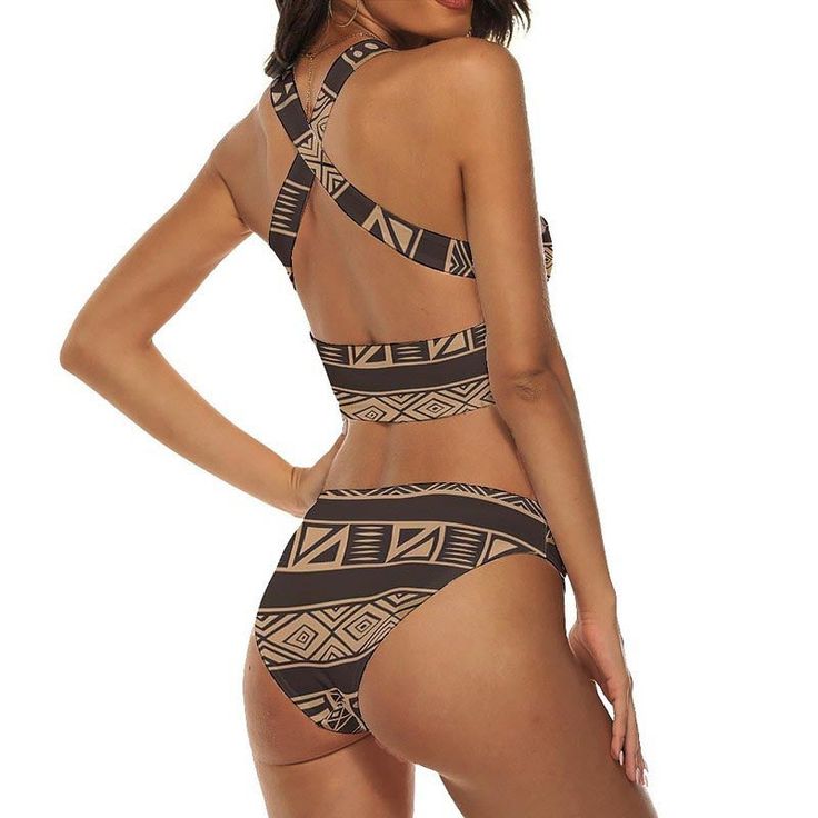 This African Print Bikini Set Swimsuit is a stylish swimwear option that’s perfect for beach days or swimming pool trips. It’s made of 100% high-quality fabric, making it durable and quick-drying. The African print design adds a unique, stylish touch to this swimsuit. Make a statement this summer with this chic and fashionable swimwear. Product Features Please Compare your Measurements To our Size Chart Before Purchase • 88% Polyester, 12% Spandex• Fabric weight: 250g/m²• Skinny fit with Cross b Printed Stretch Tankini For Sunbathing, Stretch T-back Tankini For Beach, Printed Stretch Swimwear For Beach Party, Stretch Printed Swimwear For Pool, Printed Triangle Top Swimwear For Surfing, Beachwear Tankini For Surfing Vacation, Printed Stretch Swimwear For Beachwear, Vacation Surfing Beachwear Swimwear, Printed Tankini For Surfing Beachwear