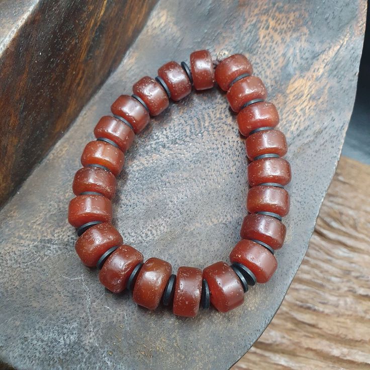 Antique Tire Shape Carnelian Agate 12mm Beads Bracelet BRGT-2
This is a stunning antique tire shape carnelian agate 12 mm beads bracelet. The
bracelet is made of high quality pre-1800 agate. It is in the antique style,
with the tire shape beads giving it a unique look. This bracelet is sure to make
a statement, with its beautiful red color and originality, perfect for any
antique collector. Amber Carnelian Round Beaded Bracelets, Amber Carnelian Bracelets With Round Beads, Carnelian Bracelets With Natural Round Beads, Carnelian Bracelets With Natural Stone Round Beads, Carnelian Bracelets With Natural Round Stones, Brown Agate Beaded Bracelet With Polished Beads, Amber Carnelian Beaded Bracelets With Round Beads, Round Carnelian Beaded Bracelets With Natural Stones, Handmade Carnelian Round Bead Bracelets