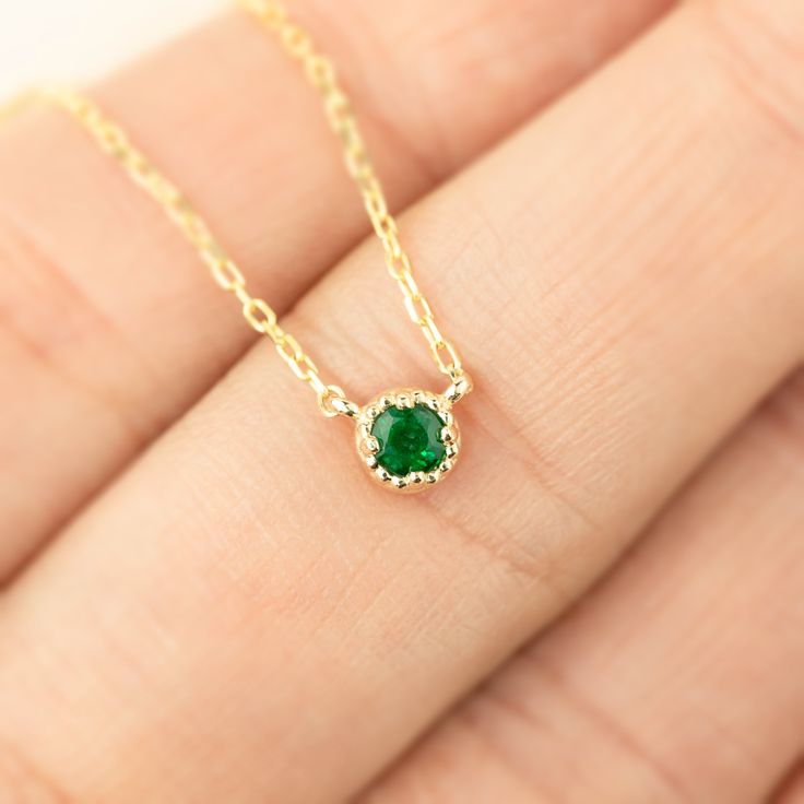 "Give this genuine birthstone stone necklace to celebrate the special month. * Stone size: ≈3mm * Setting size: ≈4.3mm * 16~18\" adjustable chain * Solid 14k yellow gold is in stock * 14k rose gold and white gold available for custom order * Made of 100% recycled precious metal and ethically sourced gemstone * Comes in a gift box with a bow ready for gifting * Handmade with love and great care in New York ~~Birthstone~~ January -Rhodlite Garnet February -Amethyst March -Aquamarine April -Diamond 14k Gold Birthstone Necklace With Round Stone, Fine Jewelry Yellow Gold May Birthstone Necklace, Gold Bezel Setting May Birthstone Necklace, 14k Gold May Birthstone Fine Jewelry Necklace, 14k Gold Fine Jewelry May Birthstone Necklace, May Birthstone Necklace In 14k Gold With Bezel Setting, 14k Gold May Birthstone Necklace, 14k Gold May Birthstone Necklace With Bezel Setting, 14k Gold Birthstone Necklace With Bezel Setting For May