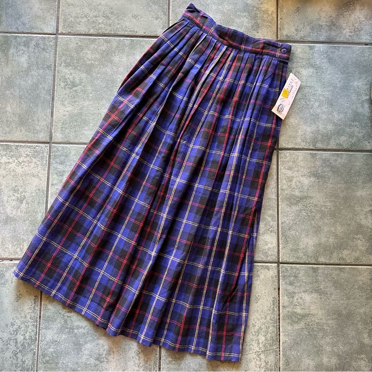 Vtg 80s 90s Plaid Blue Pleated Skirt Nwt Good Condition Brand Is Cambridge Drygoods Size 8 100% Cotton Measurements Flat Across: Waist 13 Inches Length 36 Inches Retro Blue Pleated Skirt, Blue 90s Style Skirt For Summer, 90s Style Blue Summer Skirt, Retro Long Blue Skirt, Retro Blue Midi Skirt, Blue Lined Vintage Skirt, Retro Blue Lined Skirt Bottoms, Vintage Blue Lined Skirt, Fitted Blue Skirt In 90s Style