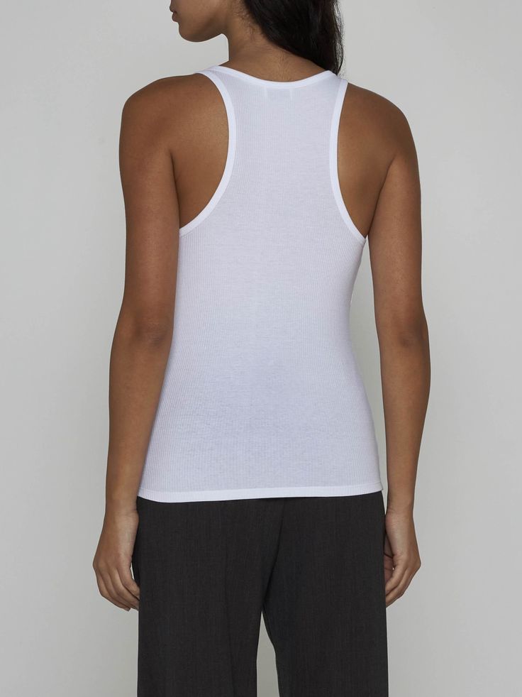 Filippa K's white ribbed knit stretch cotton tank top featuring a round neckline, racer-style and fitted silhouette. Composition: 95% cotton 5% elastane Sustainable Fashion Brands, Pleats Please Issey Miyake, Cotton Tank Top, Fitted Silhouette, Knit Cotton, Luxury Retail, S Models, Stretch Cotton, Round Neckline