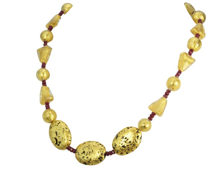 "Ruby and Gustav" NecklaceModern, elegant, yet reminiscent of a Klimt painting during the Art Nouveau period. "The Kiss" or "Lady in Gold" (portrait of Adele Bloch-Bauer) is inspiration for this ruby and gold necklace. "Ruby and Gustav" is designed with crystal 24 Karat gold foil triangle and round Venetian lampwork glass beads, dazzling natural dark red faceted African rubies (60 in all), hand-gilded 23-Karat gold on lava stone, finished with 14-Karat Gold-Filled toggle clasp and my signature t Festive Gold Gemstone Necklace, Yellow Gold Temple Necklace With Gemstone For Gifts, Unique Single Strand Gold Jewelry, Festive Gold Necklaces With Natural Stones, Formal Gold Necklace With Gemstone, Unique Gold Single Strand Jewelry, Contemporary Gold Pendant Jewelry, Luxury Yellow Gold Temple Necklace For Formal Events, Luxury Yellow Gold Temple Necklace For Formal Occasions