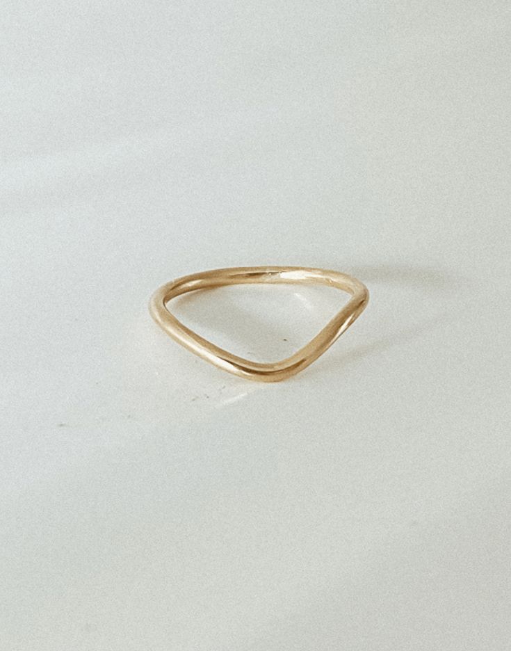 Our peak ring was made for stacking and is perfect if you’re looking for a simple band with an arch setting. Wear it as a thumb ring or stacked with our bold pearl ring. Handmade to order in 14k gold filled to withstand daily wear time after time. Tarnish-proof + safe to wear through hand-washing Time After Time, Simple Band, Evil Eye Ring, Thumb Ring, Eye Ring, Thumb Rings, Ring Handmade, Pearl Ring, Wear It