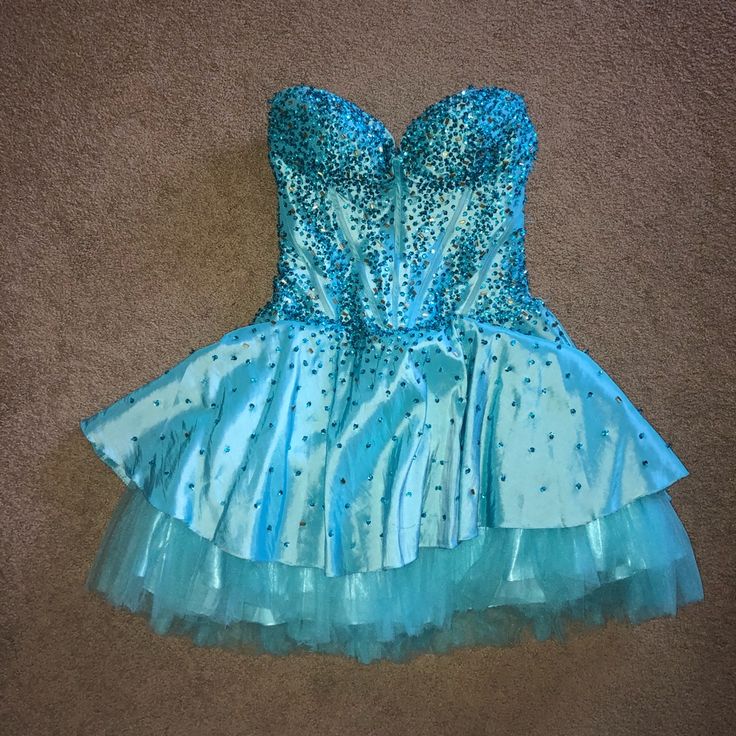 Size 00 Beaded Teal Blue Corset Homecoming Dress! Used To Be A 10 And Was Taken In To Fit Me! Would Best Fit Someone Who Is A True 00/0 Some Beads Have Come Off But It’s Not Very Noticeable! Please Ask Questions! Needs To Be Dry Cleaned. A Few Beads Missing Corset Homecoming Dress, Beaded Corset, Cinderella Blue, Blue Corset, Cinderella Dresses, Homecoming Dress, Size 00, Teal Blue, Blue Gold