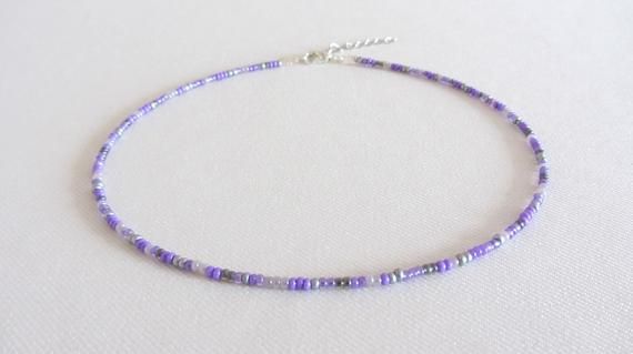 Beaded Choker Necklace Purple Choker Lilac Choker Silver gray Necklace Beach Choker handmade Seed Bead Choker hippie Boho Choker jewelryThis choker necklace is made of purple, silver and gray glass beads.Please choose the color of the fastener and the length of the necklace from the drop-down menu or request an arbitrary length.Each necklace has a 2 inch extension chain.The color in the photo may vary slightly . Bohemian Purple Beads For Beach, Summer Bohemian Gemstone Beads, Gray Bohemian Necklace With Round Beads, Bohemian Gray Beaded Necklaces, Bohemian Gray Round Bead Necklace, Bohemian Gray Beaded Jewelry, Handmade Lavender Beaded Necklaces, Handmade Adjustable Lavender Beaded Necklaces, Handmade Purple Beaded Necklace For Summer