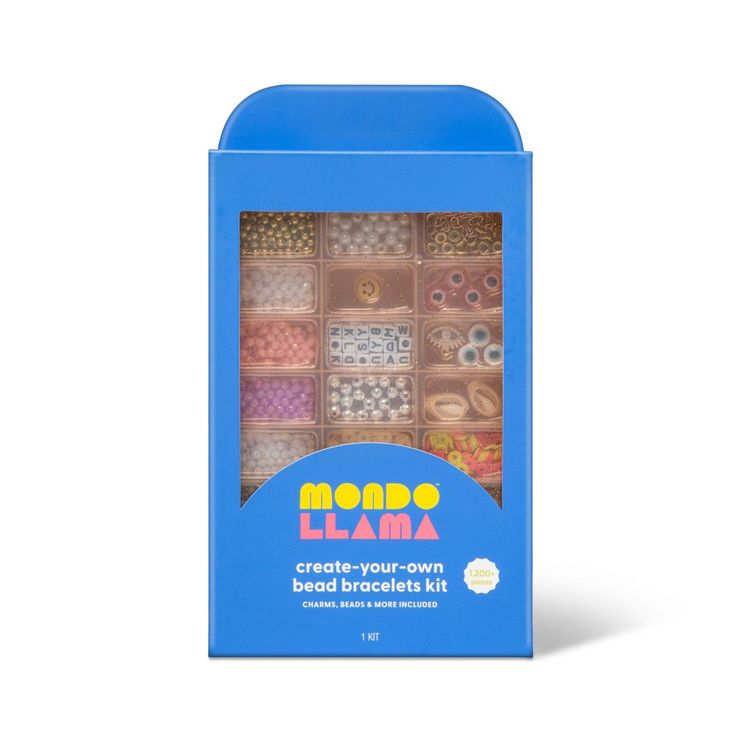 a blue box filled with lots of different types of bead beads on top of a white background