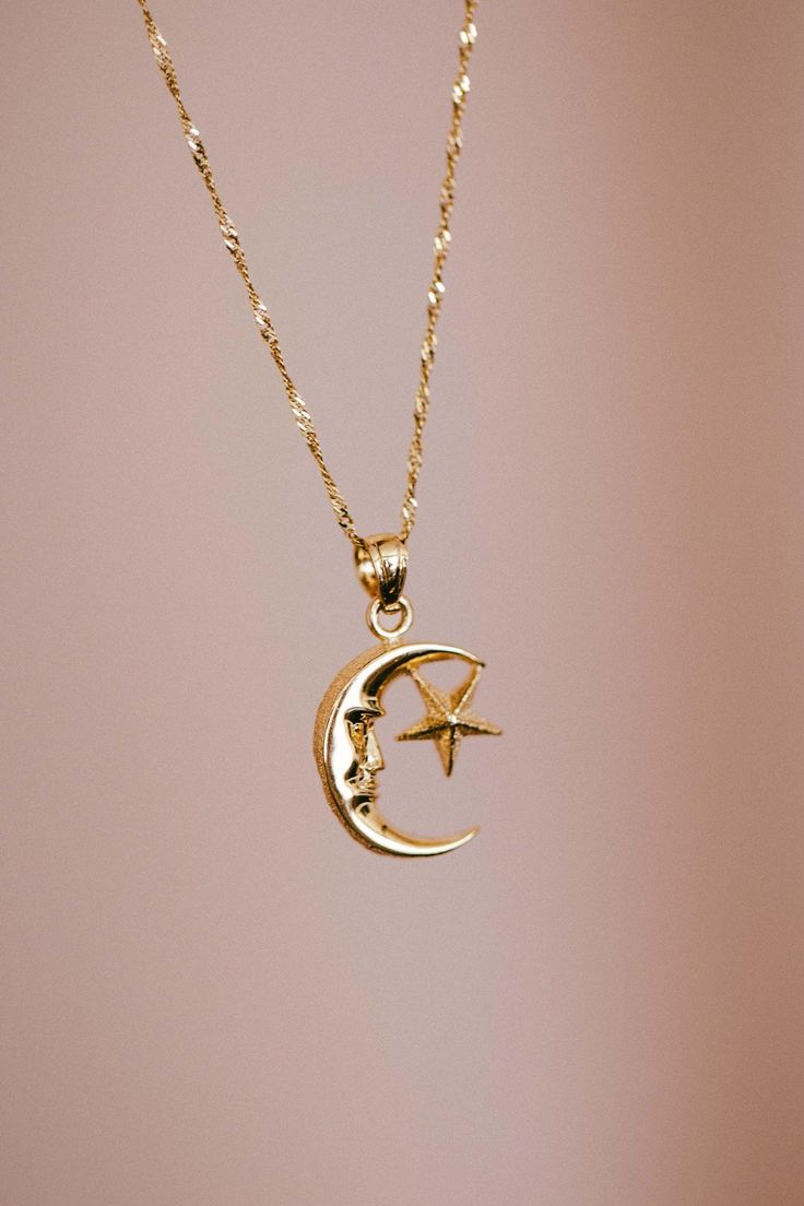 14k Solid Yellow Gold Moon And Star Pendant Charm | Luna Estrella Necklace | Astrology Jewelry Gift * Metal: 14K Yellow  Gold * Pendant Length: 16.9mm (0.6") * Pendant Width: 12.6mm (0.4'') * Pendant Avg Weight: 1.0g * Stamp: 14K * Chain Style & Length : 14k Yellow Gold 18"  Singapore (necklace set-option) * Complimentary Gift Box Guaranteed 14k real Gold NOT gold plated or filled. Image may be enlarged to show details. Please read description.  Return Policy  I gladly accept returns and exchanges Contact me within: 3 days of delivery Ship items back within: 7 days of delivery I don't accept cancellations But please contact me if you have any problems with your order. The following items can't be returned or exchanged Because of the nature of these items, unless they arrive damaged or defe Gold-plated Star Jewelry With Moon Charm, 14k Gold Star-shaped Moon Charm Jewelry, 14k Gold Celestial Jewelry Featuring Moon Phases, Celestial Crescent Jewelry With Star Charm, Celestial Style 14k Gold Half Moon Jewelry, Celestial Half Moon 14k Gold Jewelry, Gold Celestial Jewelry With Star Charm, Gold Star Jewelry With Moon Phase Detail, Gold Star-shaped Jewelry With Moon Phase Detail