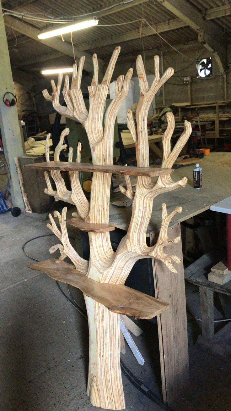 a wooden tree that has been made into a bench