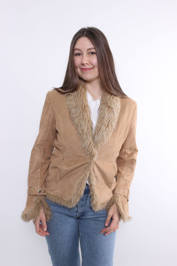 Hi! This is vintage from 90s penny lane coat in beige color way with faux fur.  This jacket made of POLYESTER. The model in the photo is 170 cm tall and is wearing a MEDIUM size overcoat.  But, be careful, this is a vintage size, it is better to check the measurements below in the product description. Sleeve - 48cm / 18.89inch ( armpit to end of sleeve); Width - 46cm / 18.11inch; Length - 58cm / 22.83inch; All measurements are taken seam to seam while lying flat. This item is vintage, so it can have some defects. Additional photos can be send! We are glad that you are interested in lots that we sell. Wish you a good shopping! FOLLOW US : Instagram: https://www.instagram.com/olena_vintage Penny Lane Coat, Coat Vintage, Penny Lane, Faux Fur Jacket, Fur Jacket, Beige Color, Halloween Shopping, Penny, Favorite Outfit