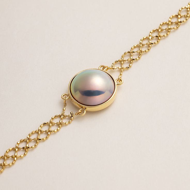 Material: 18K gold and Mabe Pearl Mabe Pearl saltwater cultured pearl Size of pearl: 12.0-13.0 mm Length of Chain: around 18.5cm (Adjustable) Handpicked of every pearl, only the top 1% of pearls are selected Handcrafted Lifetime warranty Formal Pearl Charm Chain Bracelet, Formal Adjustable Pearl Chain Bracelet, Luxury Pearl Drop Bracelets For Formal Occasions, Timeless Formal Bracelet With Pearl Chain, Luxury Pearl Chain Bracelet For Formal Occasions, Timeless Formal Pearl Chain Bracelet, Formal Pearl Bracelet With Round Beads And Pendant, Formal Pearl Bracelet With Pearl Pendant, Luxury Akoya Pearl Bracelet With Pearl Chain