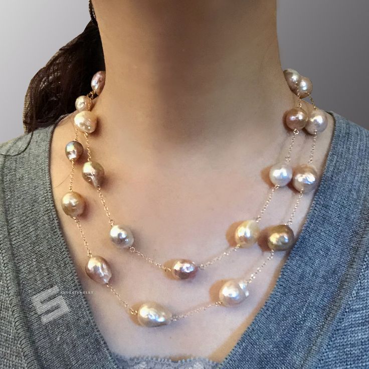 Very unique metallic multicolored freshwater baroque pearls, Pearls size measured from 9-13mm, every pearl holds beautiful golden or silvery tone, The metal is 14K gold filled, used heavy duty lobster claw clasp, very durable! You can wear it as single strand long necklace or double strand floating necklace as you wish too. It is a perfect gift for Anniversary, Birthday, Engagement, Wedding, Mother's day, Valentine's day or just a reward for yourself. Quality: AA++ Color: Natural metallic multic Gold Baroque Single Strand Necklace, Gold Briolette Pearl Necklace, Gold Akoya Pearl Necklace With High Luster, Gold Pear-shaped Single Strand Pearl Necklace, Gold Baroque Pearl Necklace In Briolette Shape, Gold Briolette Baroque Pearl Necklace, Gold Baroque Pearl Necklace With High Luster, Yellow Gold Pearl Necklace With High Luster Baroque Pearls, Yellow Gold High Luster Baroque Pearl Necklace