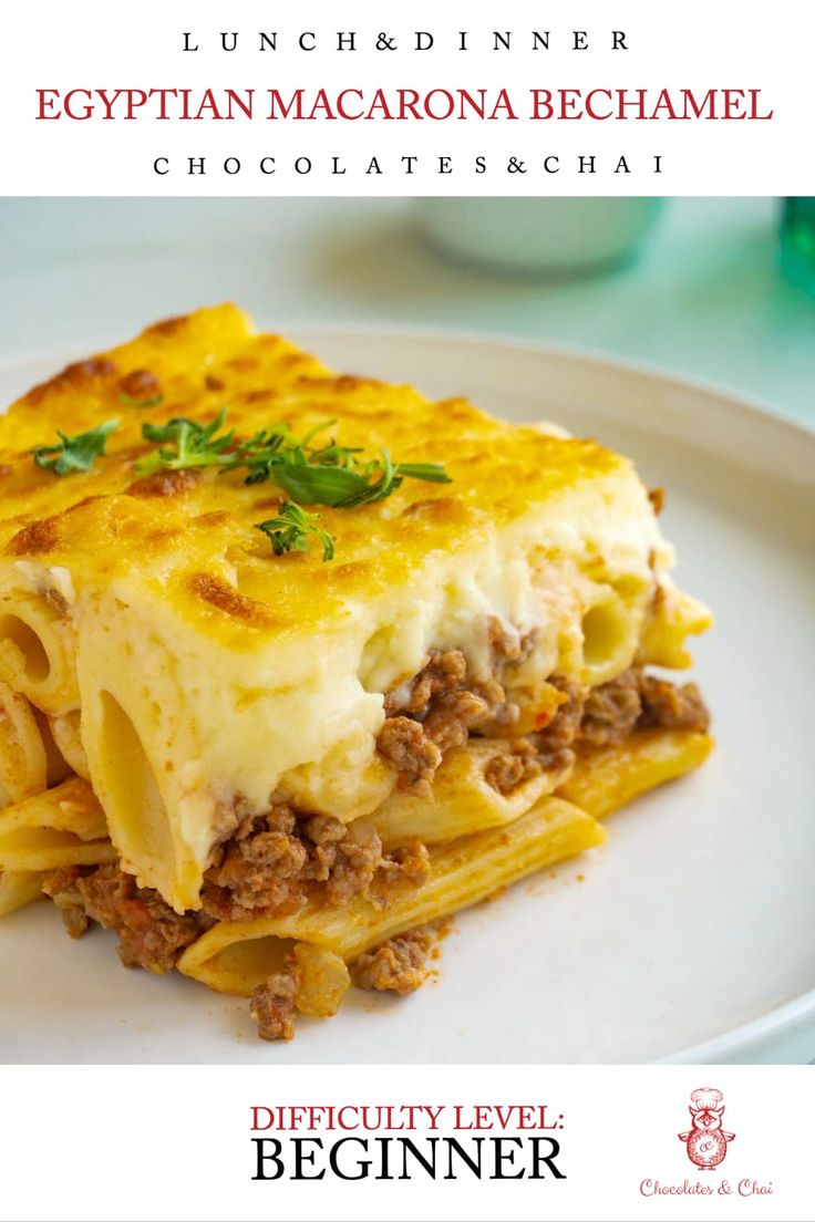 a white plate topped with lasagna and cheese