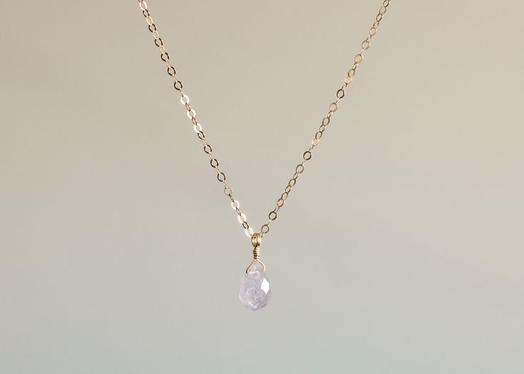 The loveliest gentle purple cape amethyst is featured on a necklace of sparkling chain, in your choice of sterling silver or 14k gold filled. This delicately hued drop is ethereally beautiful and will not disappoint. The cape amethyst necklace arrives gift ready. Necklace details + 14mm cape amethyst faceted drop + Fine 1.3mm cable chain + Spring clasp closure Spiritual Jewelry With Delicate Chain For Everyday, Spiritual Delicate Chain Jewelry For Everyday, Spiritual Everyday Jewelry With Delicate Chain, Dainty Pendant Crystal Necklace For Her, Dainty Crystal Pendant Necklace As Gift For Her, Dainty Crystal Necklaces For Gifts, Dainty Everyday Pendant Jewelry, Dainty Crystal Necklace For Gift, Dainty Round Crystal Necklace For Gift