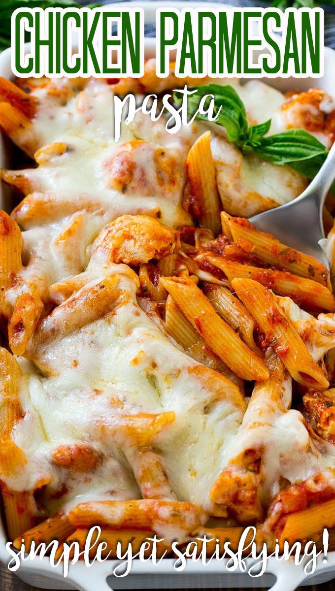 chicken parmesan pasta in a white casserole dish