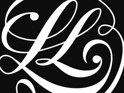 the letter l is made up of swirls and curls in white on a black background