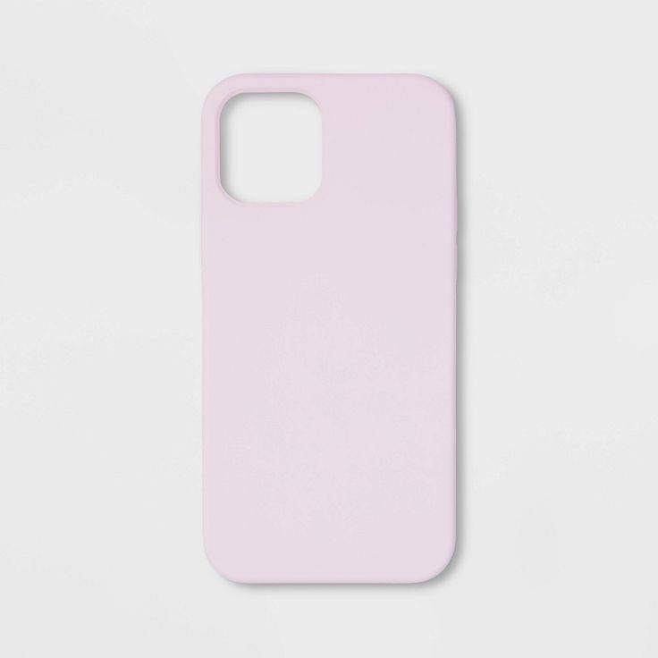 a pink phone case sitting on top of a white surface