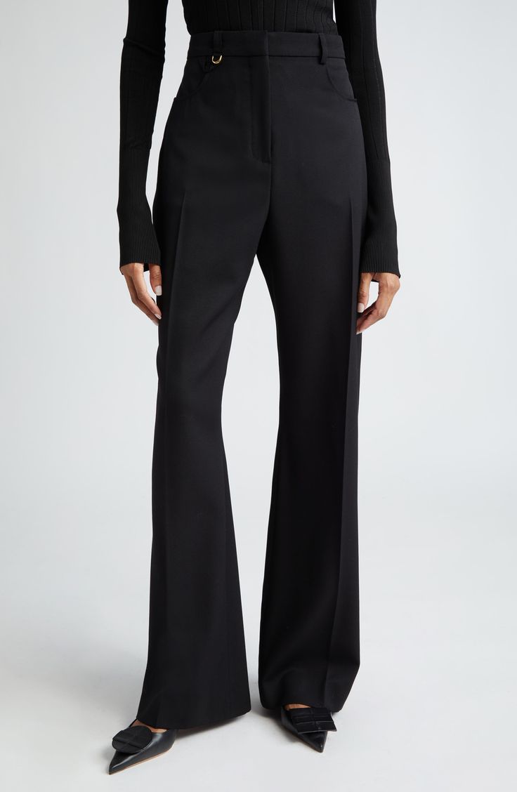 Crisp creases further the polished look of these high-rise wool pants designed in a flare-leg silhouette. 34" inseam; 24" leg opening; 14 1/2" front rise; 17" back rise (size 42) Zip fly with hook-and-bar closure Front scoop pockets 100% wool Dry clean Imported Designer Clothing Designer Clothing Brands, High Waisted Flares, Flare Leg Pants, Flare Trousers, Pants Design, Office Style, Wool Pants, High Waisted Trousers, Office Fashion