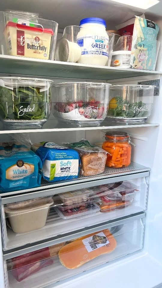 an open refrigerator filled with lots of food