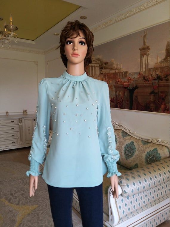 womens aqua lace blouse M aqua blouse statement blouse High Neck Blouse beads Blouse blouse peasant blouse Victorian Blouse lolita blouse high collar blouse 70% сotton 30% polyesterPlease refer to photos for details of condition. Condition: very good vintageMeasurements:Length: 61 cm/24"Sleeve : 58 cm/22.8"Shoulder to shoulder: 36 cm/14.2"Bust: 90 cm/35.4 "Waist 80 cm/31.5 "Tag Size 14noteThe color on the pictures may vary due to monitor settings and light reflections.Ready to shipPlease do not Chic High Neck Blouse For Party, High Neck Evening Blouse For Fall, High Neck Fitted Blouse For Party, High Neck Fitted Party Blouse, Fitted High Neck Blouse For Party, Chic High Neck Blouse For Formal Occasions, Elegant High Neck Blouse For Work, Elegant High Neck Fitted Blouse, High Neck Blouse For Spring Formal Events