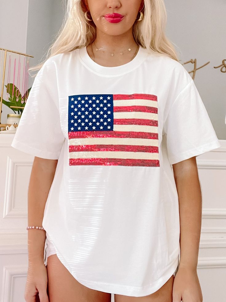 Born in the USA Tee | sassyshortcake.com White T-shirt With American Flag For Independence Day, White American Flag T-shirt For Independence Day, Red Americana T-shirt With American Flag, White Americana T-shirt For 4th Of July, Sequin Cotton T-shirt With Short Sleeves, White Americana T-shirt For Summer, Sequin Short Sleeve Cotton T-shirt, Sequined Cotton T-shirt With Short Sleeves, White American Flag Top For Memorial Day