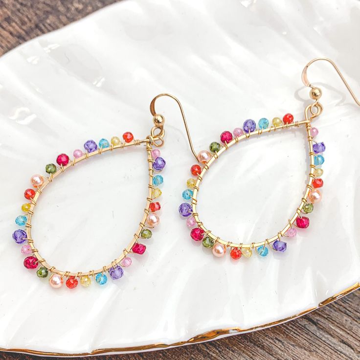 Colorful and light, everyday style hoops. 2” Trendy Multicolor Teardrop Jewelry, Multicolor Small Hoop Jewelry For Spring, Summer Everyday Dangle Hoop Earrings, Summer Teardrop Hoop Earrings, Everyday Multicolor Teardrop Jewelry, Trendy Colorful Hoop Earrings For Party, Trendy Teardrop Hoop Earrings, Trendy Spring Dangle Hoop Earrings, Trendy Dangle Hoop Earrings For Spring