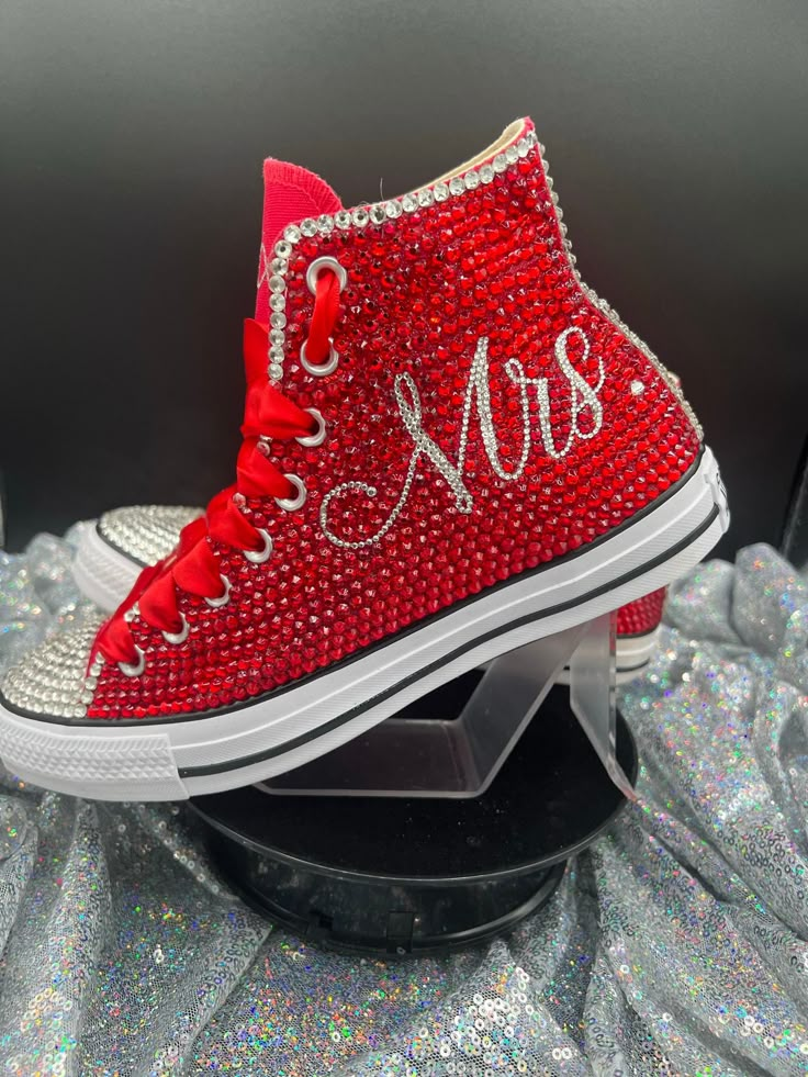 Our shoes have something to SAY! We specialize in All. Things. Blinged! Any event. Any customization you can think of we can bring to life! Message us for more information. You can also see more pictures and products at www.mykicksbling.com. PLEASE READ In the order notes section, please indicate your NEED BY date as well as the design you have in mind. The pictures in the listing change positions so pic #4 may be #2 tomorrow so please specify the design. You can screen shot and message me with Bedazzled Chucks, Decorated Sneakers, Wedding Assesories, Sequin Converse, Bling Sneakers, Biker Wedding, Bedazzled Shoes, Bridal Sneakers, Tie Sneakers