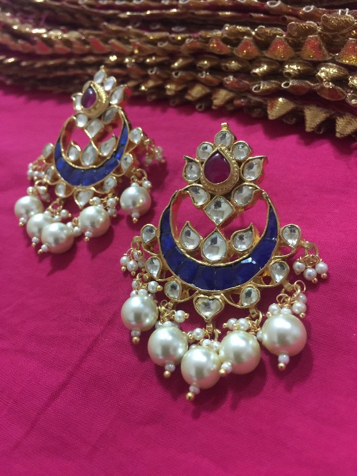 *It's Handmade Indian Ethnic Kundan Chandbali Designer Fashion Earrings with Pink and Blue Combination. *It's Multi Color Kundan Stones Settings and 22k gold Plating as shown in picture. *It is Real Kundan Design with Antique Touch and 2 inch long with hangings of pearls. *Our all jewelry is made from semiprecious stones and beads. *WARRANTY: ITS GENUINE HANDMADE JEWELRY AND WE ARE GIVING LONG LIFE WARRANTY FOR OUR ALL ITEMS. All of our Kundan Jewelry is 100% handmade with ancient Kundan stone s Blue Jhumkas Drop Earrings For Festive Occasions, Blue Festive Jhumkas Drop Earrings, Blue Bohemian Jhumkas For Festive Occasions, Blue Danglers For Diwali Gift, Blue Danglers For Diwali Celebration, Blue Latkans Danglers For Party, Blue Danglers With Latkans For Party, Blue Chandbali Danglers For Celebration, Blue Jhumkas For Festivals And Celebrations