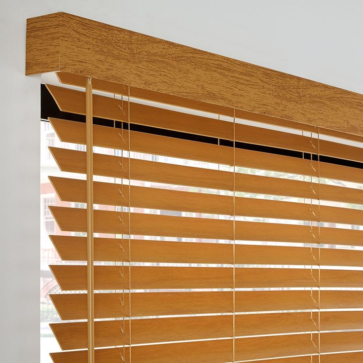 a window with wooden blinds on it