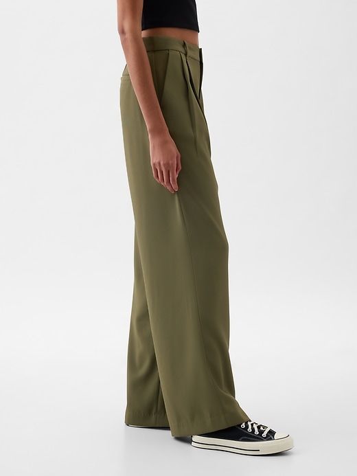 365 High Rise Pleated Trousers | Gap Elegant Gap Straight Leg Bottoms, Chic Straight Pants By Gap, Versatile Spring Dress Pants For Work, Chic Gap Straight Leg Pants, Gap High-waisted Work Pants, Gap Work Pants With Elastic Waistband, Gap Straight Pants For Work, Versatile Tailored High-waisted Wide Leg Pants, Chic Tapered Leg Pants For Daywear