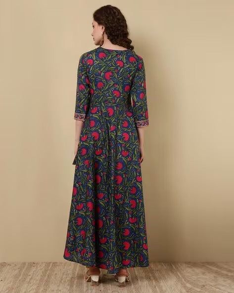 Introducing our Blue & Pink Cotton Floral Print & Thread Work Detailing Angrakha Anarkali Kurta, a vibrant fusion of style and culture. Crafted from viscose rayon with floral print & thread work has v neck, 3/4th sleeves, ankle length with angrakha style it offers comfort and breathability all day long. Perfect for adding a pop of personality to any outfit. Single Piece Fabric: Cotton Color: Blue & Pink Neck: V Neck Sleeve: 3/4th Sleeves Work Done: Floral Print & Thread Work Detailing Washing Instructions: Machine Wash Size & Fit - Model is 5"8 wearing size small