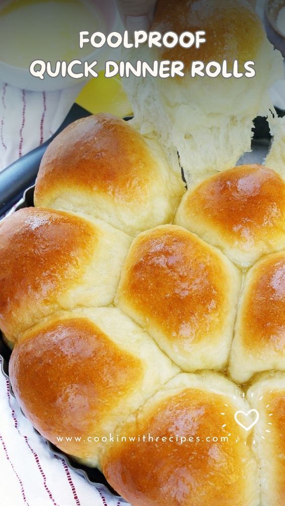 a pan filled with rolls sitting on top of a table