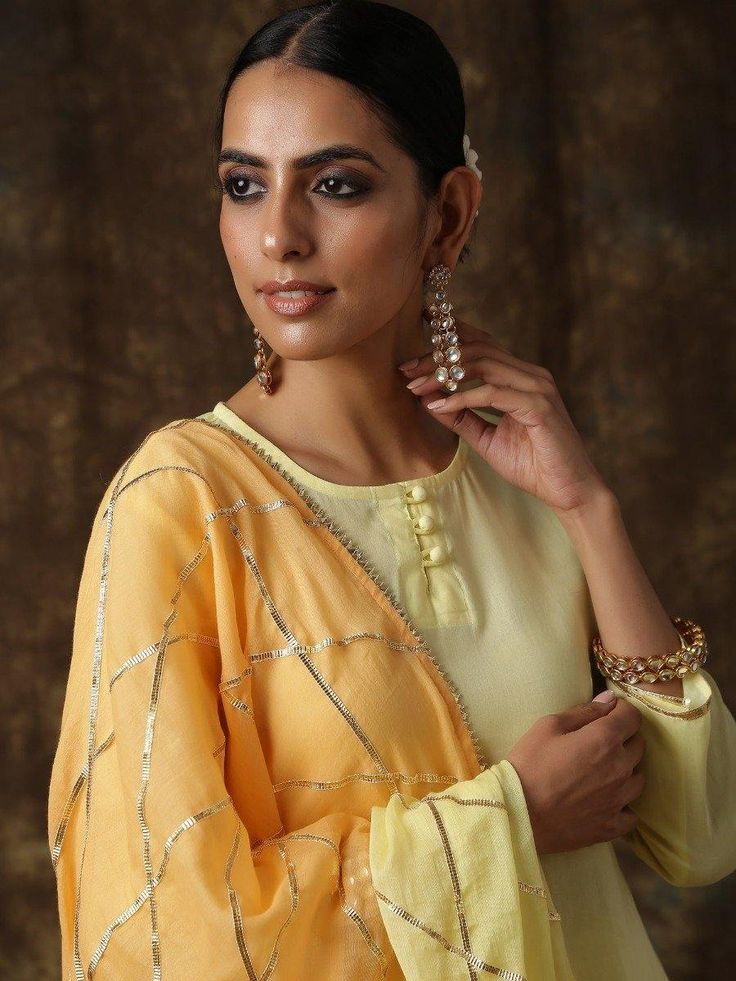 Ambika- Amaltas yellow-light orange sharara set - Trendroots Orange Chanderi Palazzo Set With Gota Work, Traditional Yellow Palazzo Set With Gota Work, Designer Orange Chinon Sharara, Yellow Palazzo Set With Gota Work And Straight Kurta, Yellow Palazzo Set With Straight Kurta And Gota Work, Navratri Cutdana Sharara With Straight Kurta, Yellow Unstitched Chanderi Palazzo Set, Yellow Chanderi Palazzo Set With Zari Work, Pista Green Palazzo Set With Gota Work