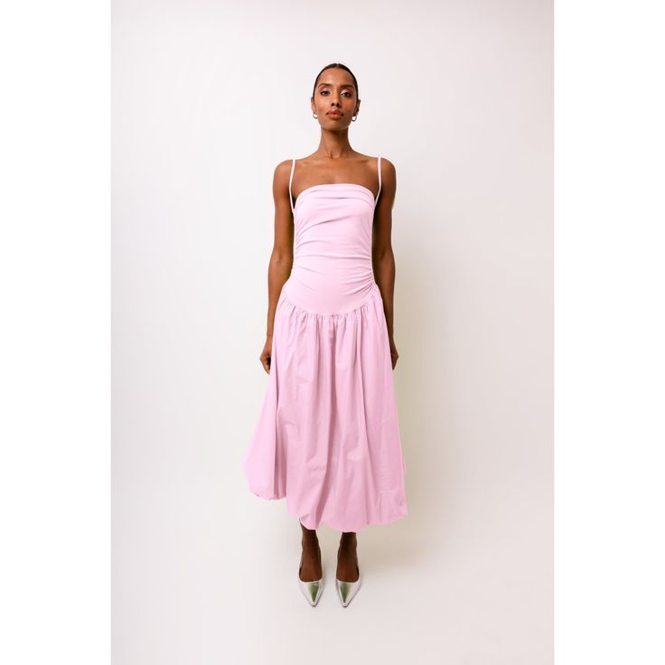 Alexa Light Pink Puffball Dress | AMY LYNN | Wolf & Badger Feminine Cotton Midi Dress With Fitted Bodice, Cotton Ruched Maxi Dress For Casual Wear, Cotton Midi Dress With Fitted Bodice, Feminine Style, Sundress With Tie Straps And Fitted Bodice, Sundress Midi Dress With Tie Straps And Fitted Bodice, Spring Dress With Voluminous Skirt And Gathered Waist, Spring Ruched Maxi Dress With Voluminous Skirt, Summer Dresses With Ruched Bodice And Voluminous Skirt, Voluminous Midi-length Gathered Skirt Dress