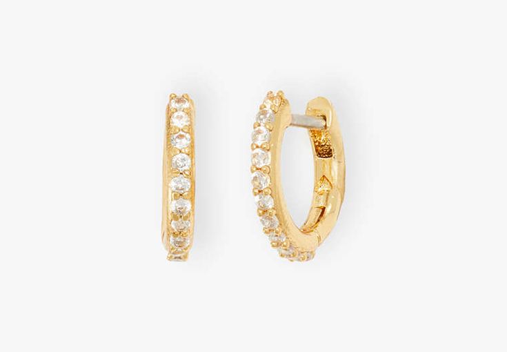 Tiny Twinkles Pavé Mini Hoops | Kate Spade New York Adjustable Cubic Zirconia Huggie Jewelry, Adjustable Huggie Cubic Zirconia Earrings, Cubic Zirconia Huggie Earrings For Formal Occasions, Adjustable Cubic Zirconia Hoop Earrings, Adjustable Cubic Zirconia Hoop Earrings For Pierced Ears, Kate Spade Gold Earrings For Anniversary, Kate Spade Classic Jewelry For Anniversary, Classic Kate Spade Jewelry For Anniversary, Spade Earrings