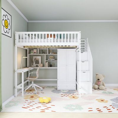 a child's bedroom with a loft bed and desk