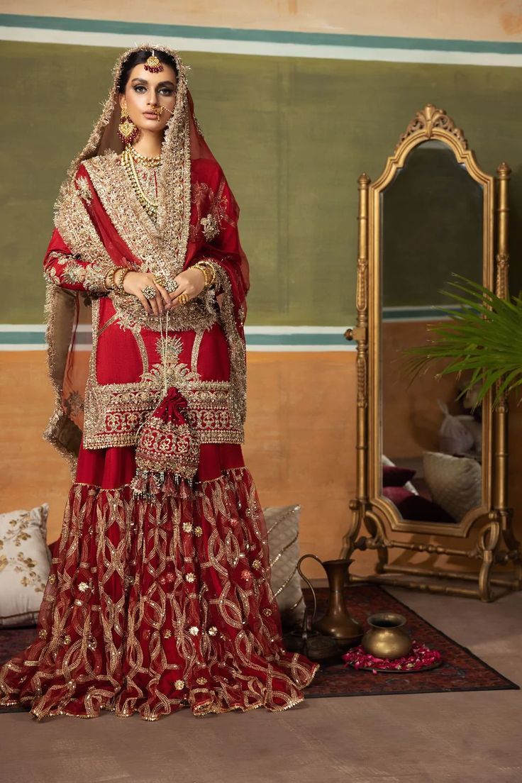 Red Bridal Sharara Shirt Pakistani Wedding Dresses Nida Sharara With Mirror Work For Wedding, Red Nida Sharara With Mirror Work, Hand Embellished Sharara For Traditional Ceremonies, Hand Embellished Traditional Sharara For Ceremonies, Red Mirror Work Salwar Kameez For Wedding, Red Salwar Kameez With Mirror Work For Weddings, Wedding Nida Sets With Mirror Work, Festive Sharara With Stone Work For Eid, Wedding Sets With Mirror Work In Nida