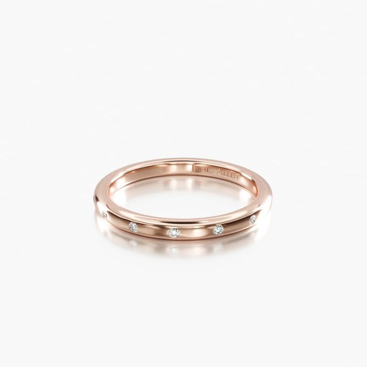 14K Rose Gold Sleek Accent Diamond Ring. This stunning high polished rounded, classic ring features diamonds that are placed and spaced elegantly to achieve a simple and sleek look. Classic Stackable Rings With Diamond Accents, Classic Rings With Polished Finish, Polished Diamond Stackable Rings, Classic Rose Gold Stackable Rings With Brilliant Cut, Modern Stackable Rings With Round Cut For Formal Events, Elegant Stackable Diamond Rings In Rose Gold, Modern Stackable Rings With Round Cut For Formal Occasions, Classic Rose Gold Diamond Stackable Rings, Timeless Rose Gold Stackable Rings With Single Diamond