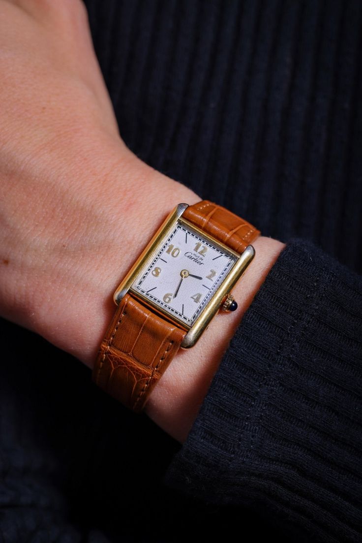 Brand: CartierMovement: QuartzMetal: Gold Plated SilverEra: VintageCirca: 1990'sHallmarks: Cartier, Numbered, Purity and Makers MarksSize: 7 inches length and Case size: 30 x 23mmGram weight: 21.47This vintage Cartier watch from the 1990s exudes timeless elegance and sophistication. Featuring a precise quartz movement, this piece is crafted from luxurious gold-plated silver. With a case size of 30 x 23mm and a total length of 7 inches, it fits comfortably on the wrist, making it a perfect access Luxury Elegant Cartier Watch Accessories, Vintage Cartier Watch, Colored Stone Engagement Rings, Yellow Gold Cocktail Ring, Unique Rings Vintage, Platinum Diamond Engagement Rings, Fancy Yellow Diamond, Colored Engagement Rings, Gold Cocktail Ring