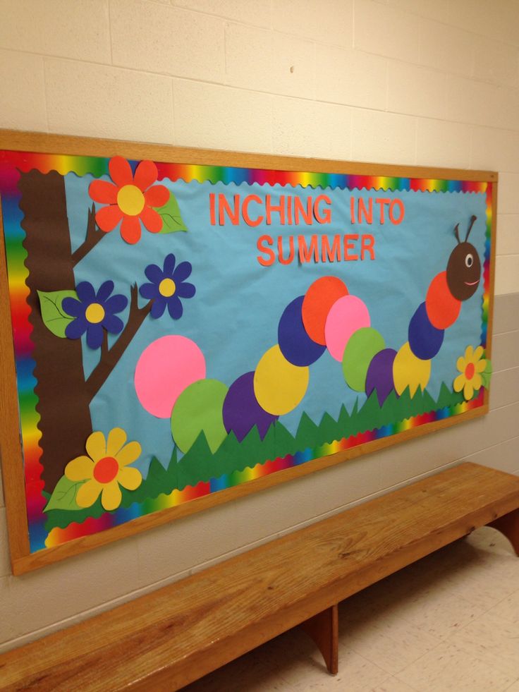 a bulletin board with an image of a caterpillar on it and the words, including