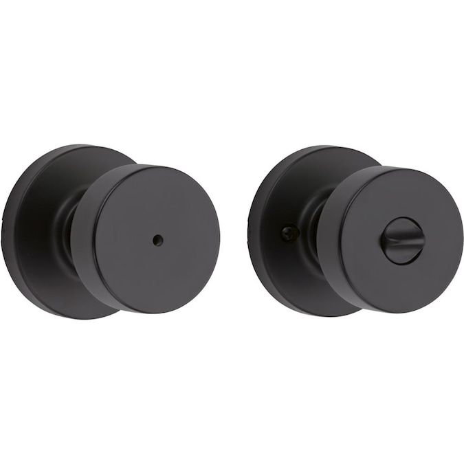 two black knobs are shown on the front and back of this door handle set