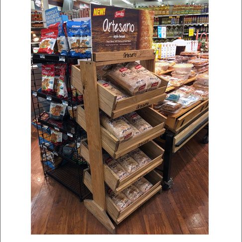 a display in a grocery store filled with lots of food and snacks on it's shelves