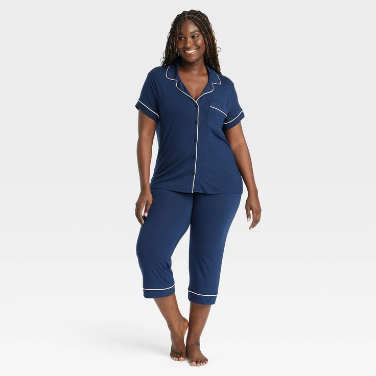 Add cool and comfy style to your everyday sleepwear collection with these Cloud-Knit Short-Sleeve Notch Collar Top and Cropped Pants Pajama Set from Auden™. Made from soft, stretchy fabric for a comfortable fit, this set includes a short-sleeve notch collar button-down top and cropped pants for a complete look. Plus, drawcord elastic waistband on the pants offers an adjustable fit. Wear the pieces as a set or mix and match with other PJs to put together a variety of sleepwear outfits. Auden™: Co Comfy Blue Sleepwear For Lounging, Blue Sleepwear Long Pants For Loungewear, Comfortable Blue Sleepwear With Relaxed Fit, Blue Long Pants Sleepwear For Loungewear, Cozy Short Sleeve Sleepwear, Casual Blue Sleepwear For Pajama Party, Cozy Blue Sleepwear For Loungewear, Casual Blue Sleepwear Pants, Blue Relaxed Fit Sleepwear For Loungewear