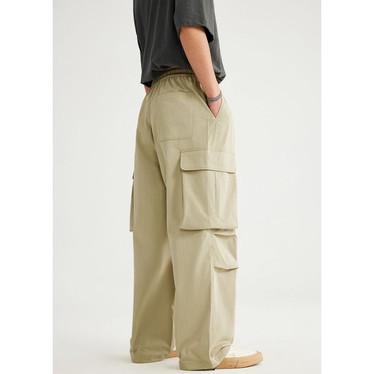 Spring/Summer Big Pocket Parachute Wide Leg Cargo Pants Fabric: 100% Polyester Size: S, M, L, XL Multiple Color Selections: Khaki  Season: Spring, Fall, Summer Summer Wide-leg Parachute Pants With Pockets, Khaki Summer Outdoor Pants, Spring Khaki Cargo Pants With Multiple Pockets, Khaki Bottoms For Leisure In Summer, Khaki Bottoms For Summer Leisure, Summer Cargo Pants With Multiple Pockets For Outdoor, Casual Straight Parachute Pants With Cargo Pockets, Solid Parachute Pants For Summer Outdoor, Summer Outdoor Solid Color Parachute Pants