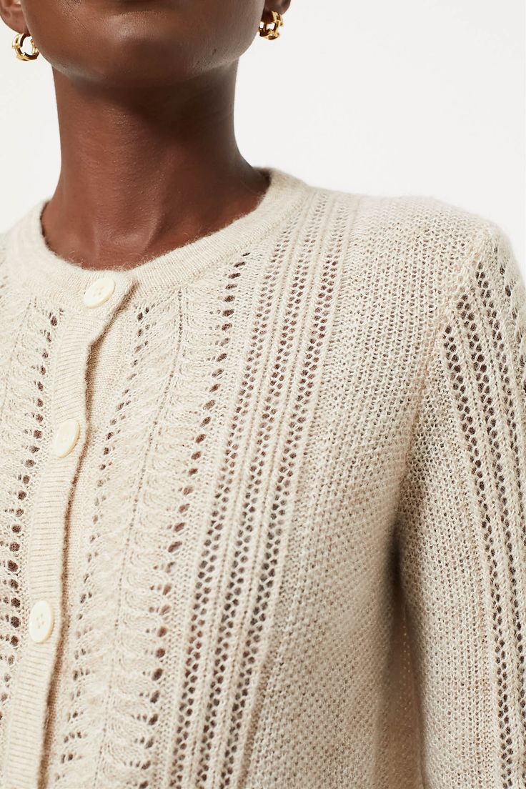 An incredibly cozy throw-on-and-go pieceKnitted from a wool blend with a touch of mohair for added softness and texture, the Champagne Addison Cardigan is delicate and warm all at once with it's open lace stitch detail. Wear this as a sweater with your fav jeans or layered over a blouse or a dress. Our Favorite Details: Open lace stitch detail Ribbed finishes Slightly cropped silhouette Material: 40% Wool, 20% Cotton, 19% Polyamide, 15% Acrylic and 6% MohairCare: Dry clean About the BrandWe love Pointelle Knit Cardigan For Layering, Classic Pointelle Knit Cardigan For Fall, Elegant Pointelle Knit Sweater For Layering, Beige Pointelle Knit Cardigan, Elegant Beige Cable Knit Cardigan, Elegant Wool Sweater With Pointelle Knit, Beige Pointelle Knit Cardigan For Winter, Elegant Cream Cable Knit Cardigan, Elegant Spring Mohair Cardigan